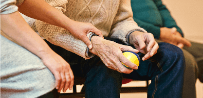 Primary care clinician with senior patient